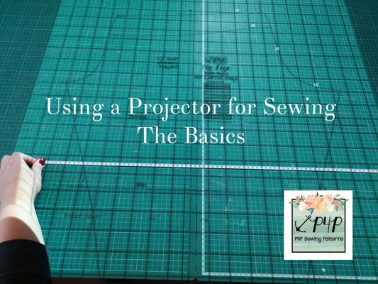 Sewing pattern projected onto a gridded cutting mat